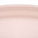 A close up of a pink Cambro tray surface.