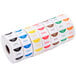 A white Noble Products dispenser with 7 rolls of colorful labels with different colors.
