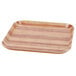 A square Cambro fiberglass tray with a wooden butcher block design.