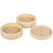 A Town bamboo steamer set with three trays and a lid.