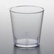 A clear plastic GET tumbler with a pebbled surface and small rim.