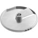 A stainless steel circular food processor blade with a hole in the center.