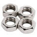 A group of metal nuts on a white background.