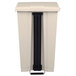 A beige rectangular Rubbermaid commercial trash can with black handle.