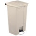 A beige rectangular plastic Rubbermaid commercial trash can with a pedal.