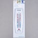 A Taylor 8" wall thermometer package with blue and red text on a white background.