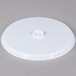 A Fineline Platter Pleasers white plastic cake stand lid.