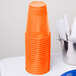 Creative Converting 28191081 16 oz. Sunkissed Orange Plastic Cup - 240/Case Main Thumbnail 3