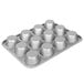 A Chicago Metallic muffin pan with 12 cupcake holders.