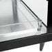 A black and stainless steel Hatco countertop food warmer with glass shelves and a glass door.