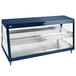 A navy blue and stainless steel Hatco countertop merchandiser with two glass shelves.