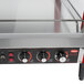 A Hatco stainless steel countertop food warmer with red knobs.
