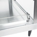 A stainless steel Hatco countertop food warmer with glass shelves and a glass door.