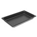 A Vollrath stainless steel rectangular steam table pan with a black SteelCoat x3 finish.