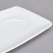 A white rectangular china tray with a circle on it.