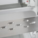 A close-up of the stainless steel shelves inside a Hatco Warm Red Stainless Steel Glo-Ray Full Service Dual Shelf Merchandiser.