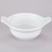 A white bowl with two handles.