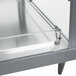 A stainless steel Hatco countertop food warmer with glass doors and shelves.
