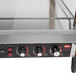 A Hatco stainless steel countertop dual shelf food warmer with a control panel.