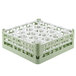 A white and green plastic Vollrath lemon drop glass rack with several small compartments.