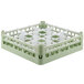 A light green plastic Vollrath glass rack with four compartments.