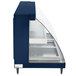 A blue Hatco Glo-Ray countertop merchandiser with glass shelves and a glass door.