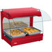 A red Hatco countertop food warmer with metal trays of food.