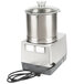 A silver and black Robot Coupe food processor with a metal bowl and lid.