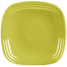 A close-up of a Fiesta® lemongrass square luncheon plate with a circle in the center.