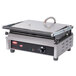 A Hatco commercial panini grill with grooved plates and a lid.