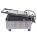 A Hatco commercial panini grill with grooved cast iron plates and a handle.