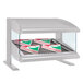 A Hatco white granite countertop heated zone merchandiser shelf with pizza boxes inside.