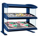 A navy blue Hatco countertop heated food display case with food on shelves.