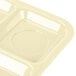 A tan Carlisle polypropylene tray with six compartments.