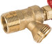The brass fill valve for Bunn coffee urns with a red hose.