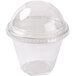 A Squat clear plastic cup with a Fabri-Kal dome lid.