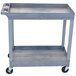 A gray Luxor utility cart with two shelves and wheels.