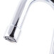 A chrome Equip by T&S wall mounted faucet with gooseneck spout and lever handles.