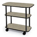 A rectangular Geneva tableside service cart with three beige shelves and black metal legs.