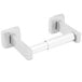A white metal Bobrick ClassicSeries surface-mounted toilet paper holder.