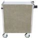 A Lakeside stainless steel utility cart with wheels and an enclosed base with a tan box on it.