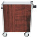 A stainless steel Lakeside utility cart with a red maple finish and metal and wood shelves.