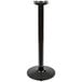 A Lancaster Table & Seating black cast iron bar height table base with a round base and cylinder shape.