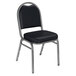 A black National Public Seating stack chair with a silver frame.