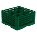 A green plastic Vollrath Traex glass rack with nine compartments.