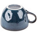 A blue Tuxton china cup with a handle.