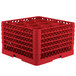 A red Vollrath Traex glass rack with 12 compartments.