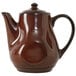 A brown Tuxton china teapot with a handle and lid.