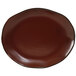 A brown platter with a black rim on a white background.