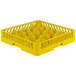 A yellow plastic Vollrath TR18 glass rack with 12 compartments.